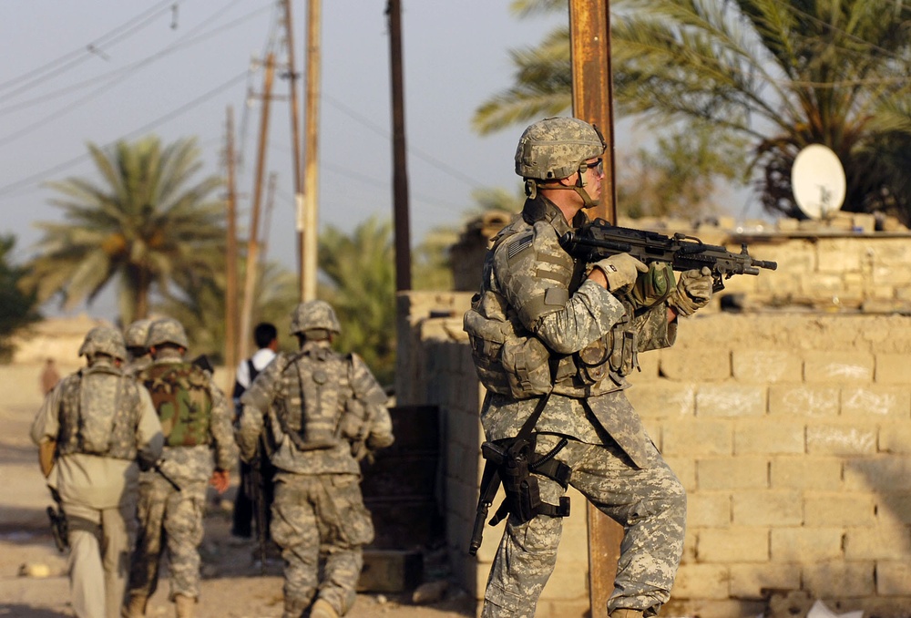 543rd Military Police Company Performs Dismounted Patrol