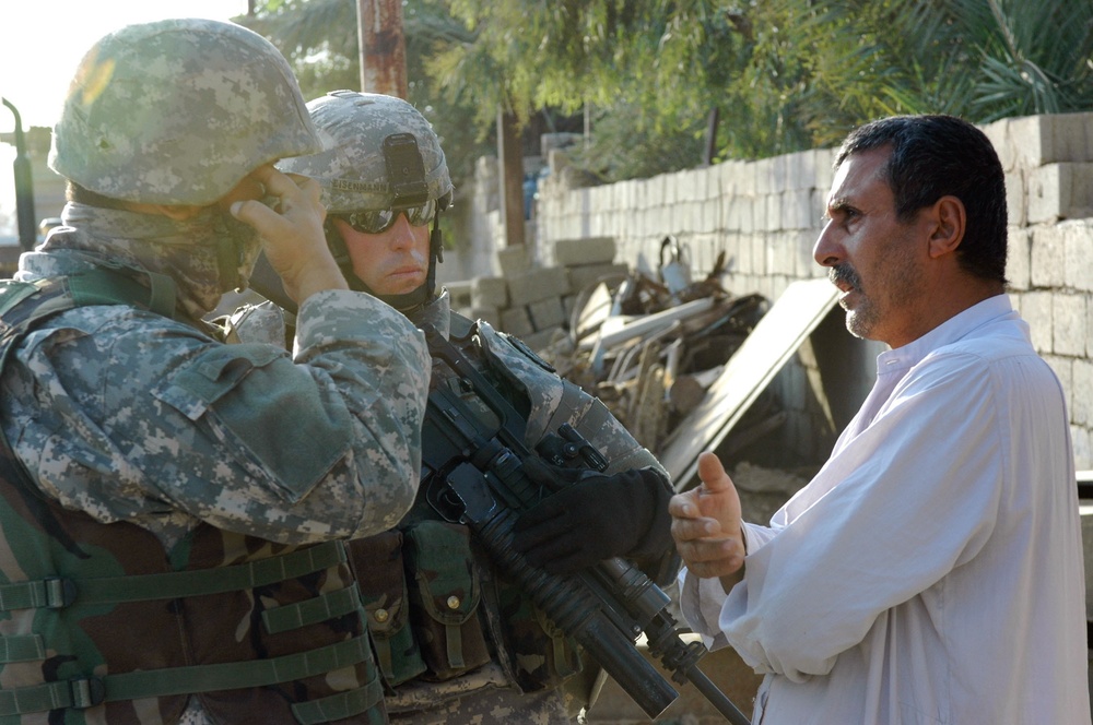 543rd Military Police Company Performs Dismounted Patrol