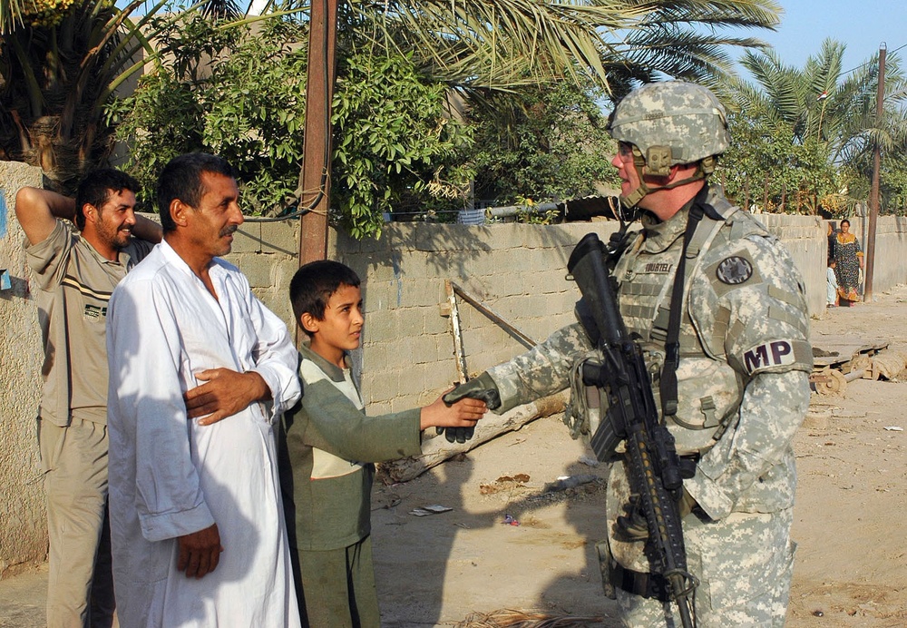 543rd Military Police Company Performs a Dismounted Patrol