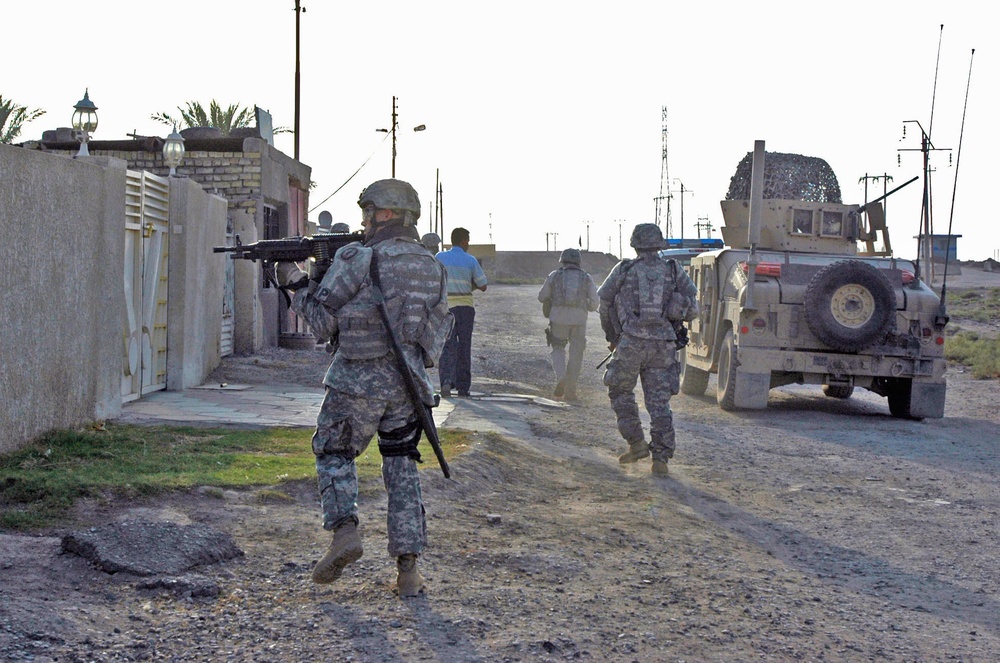 543rd Military Police Company Performs Dismounted Patrol