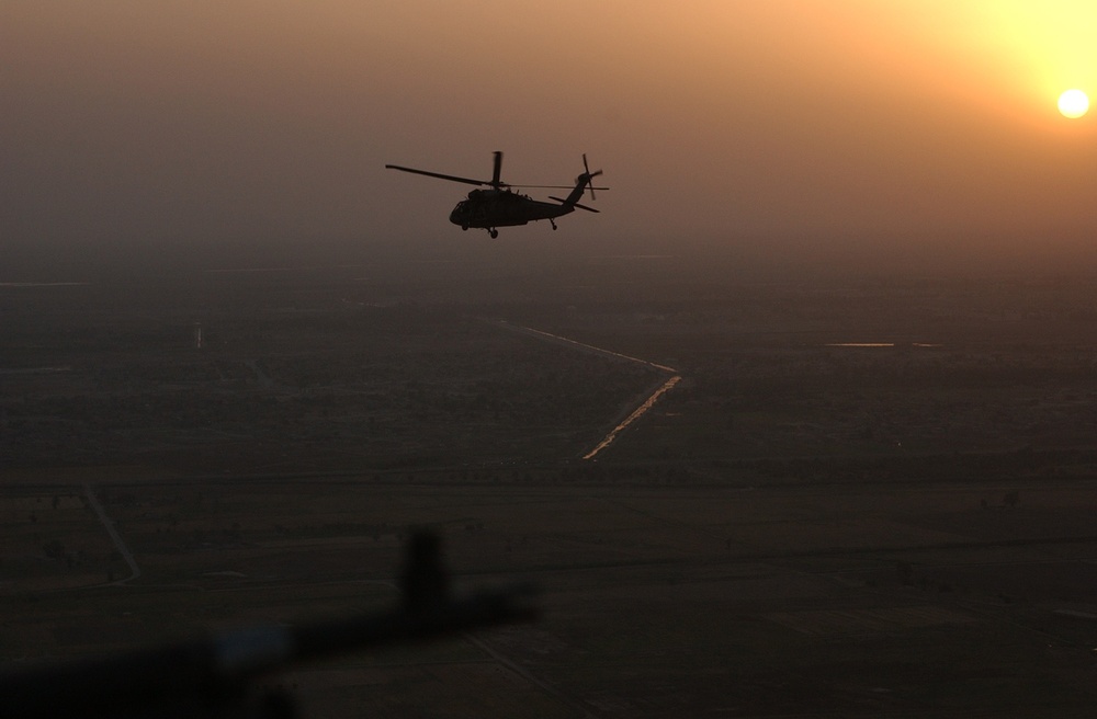 Black Hawk Drops Leaflets Over North Babil Province