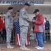 Col. Elicerio Presents Staff Sgt. Wosika's Medal to His Parents