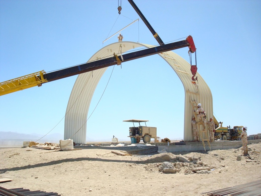 International armed forces engineers work together in Afghanistan