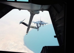 F-16 Eases up to Refueler in Midair