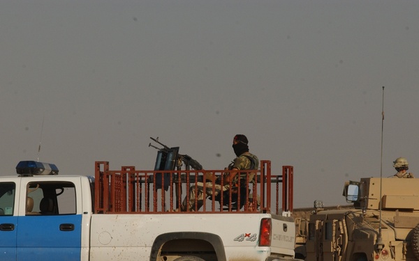 U.S. Special Force and Iraqi Security Conduct Combat Operations