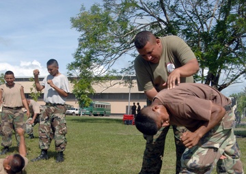 Recruits practice controlled falling techniques