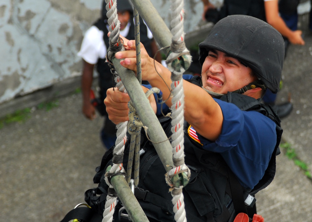 Seaman climbs 30-foot ladder