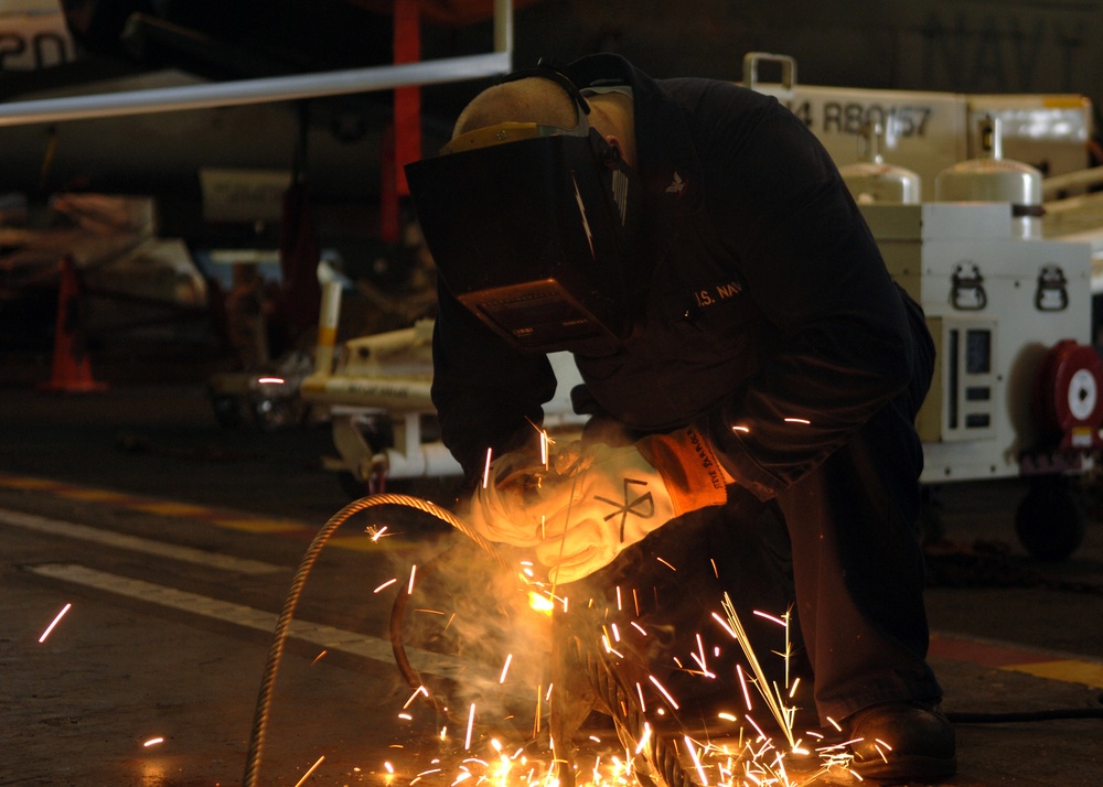 Hull Technician Welds Cable