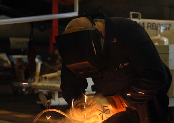 Hull Technician Welds Cable