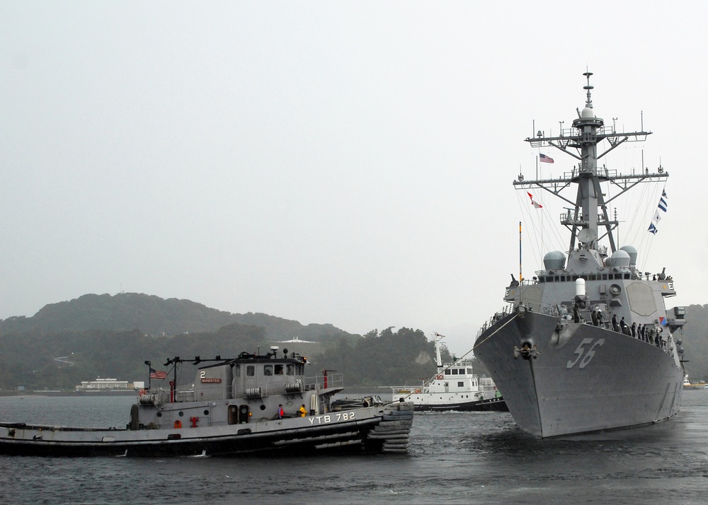 USS John S. McCain pulls out