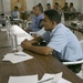 Iraqi policemen attend small arms weapons intructor course