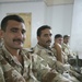 Iraqi policemen attend small arms weapons intructor course