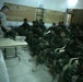 seamen teaches first aid to Iraqi provincial security forces recruits
