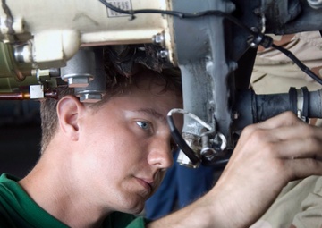 Kitty Hawk Sailor Maintains Aircraft