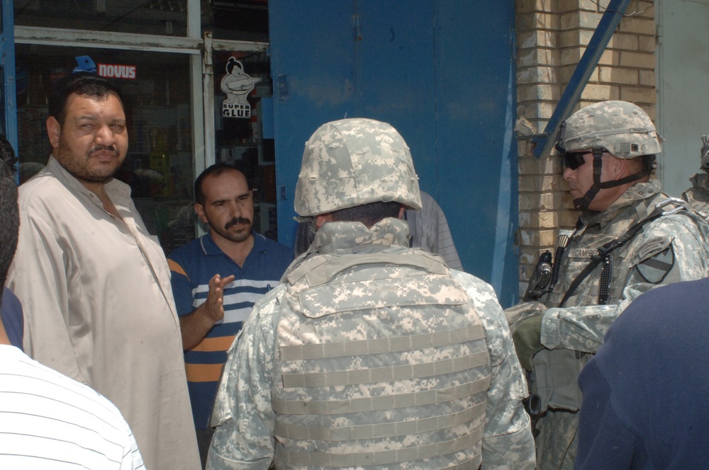 Soldiers assess Rusafa Market