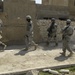 Soldiers patrol the city of Dora