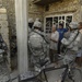 Soldiers patrol the city of Dora
