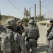 Soldiers patrol the city of Dora