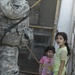 Soldiers patrol the city of Dora