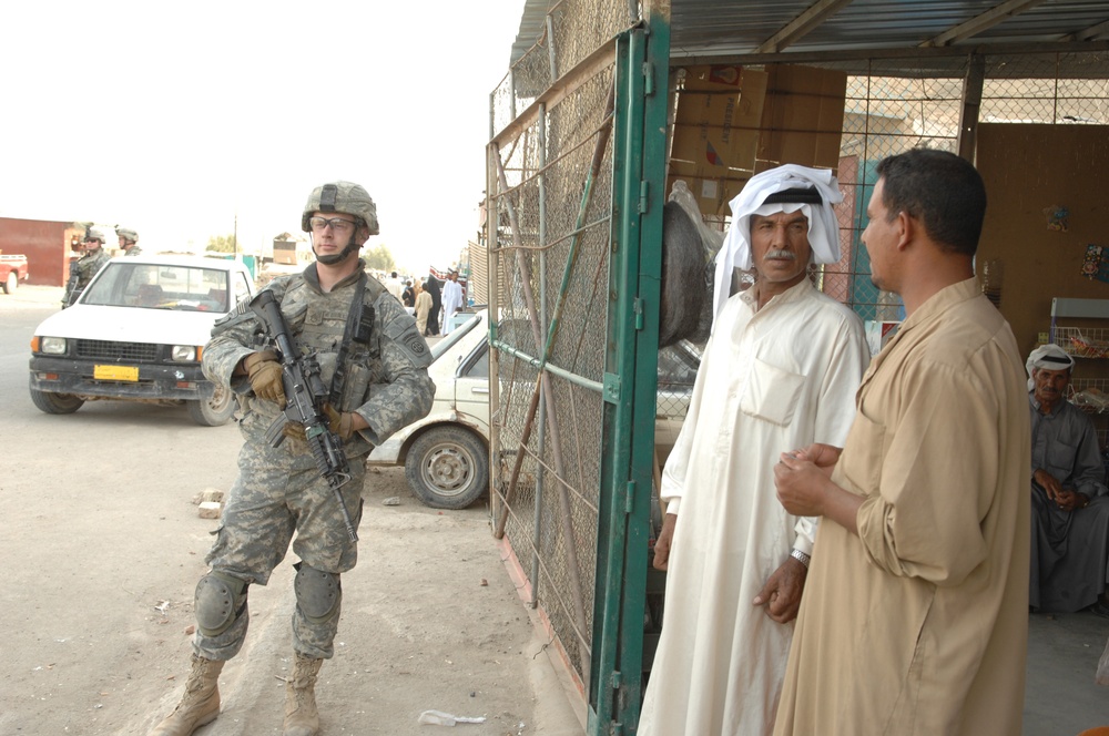Psy Ops Soldiers Talk With Iraqis