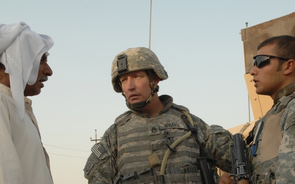Psy Ops Soldiers Talk With Iraqis