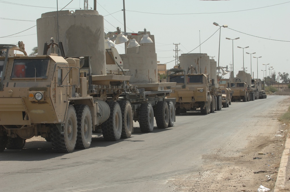 82nd Airborne Troops Help Put Up Guard Towers