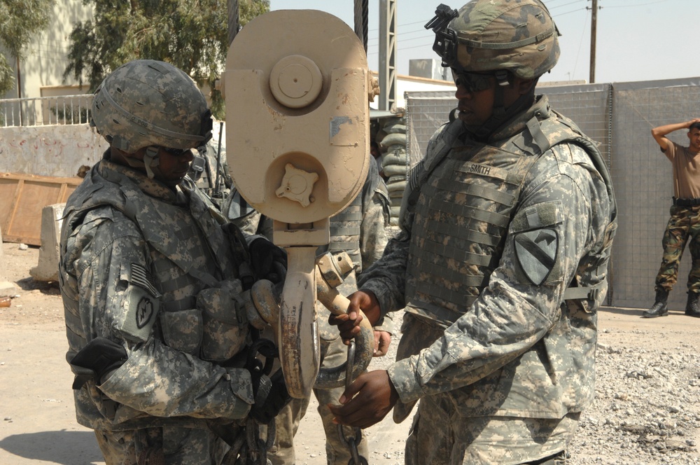 82nd Airborne Troops Help Put Up Guard Towers