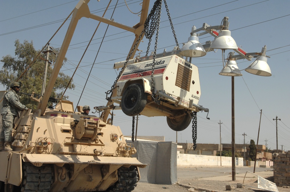 82nd Airborne Troops Help Put Up Guard Towers