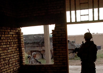 U.S. and Iraqi Security Forces Clear Baqubah Neighborhood