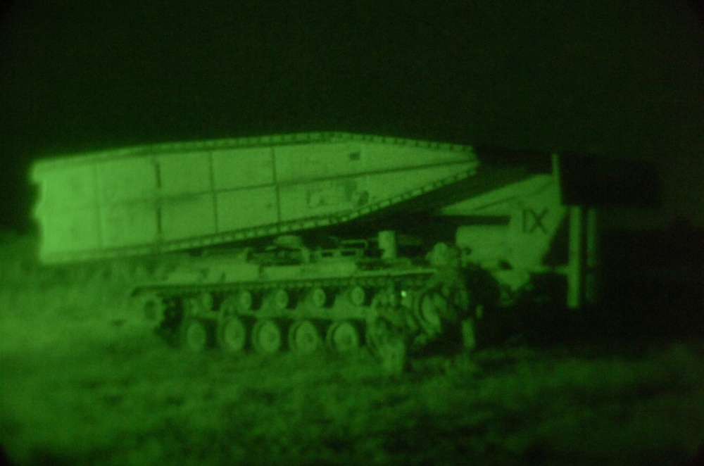 Army Vehicle Launched Bridge, Bucket Loader and the Recovery Vehicle