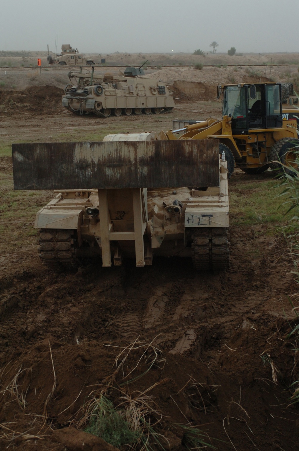 Army Vehicle Launched Bridge, Bucket Loader and the Recovery Vehicle