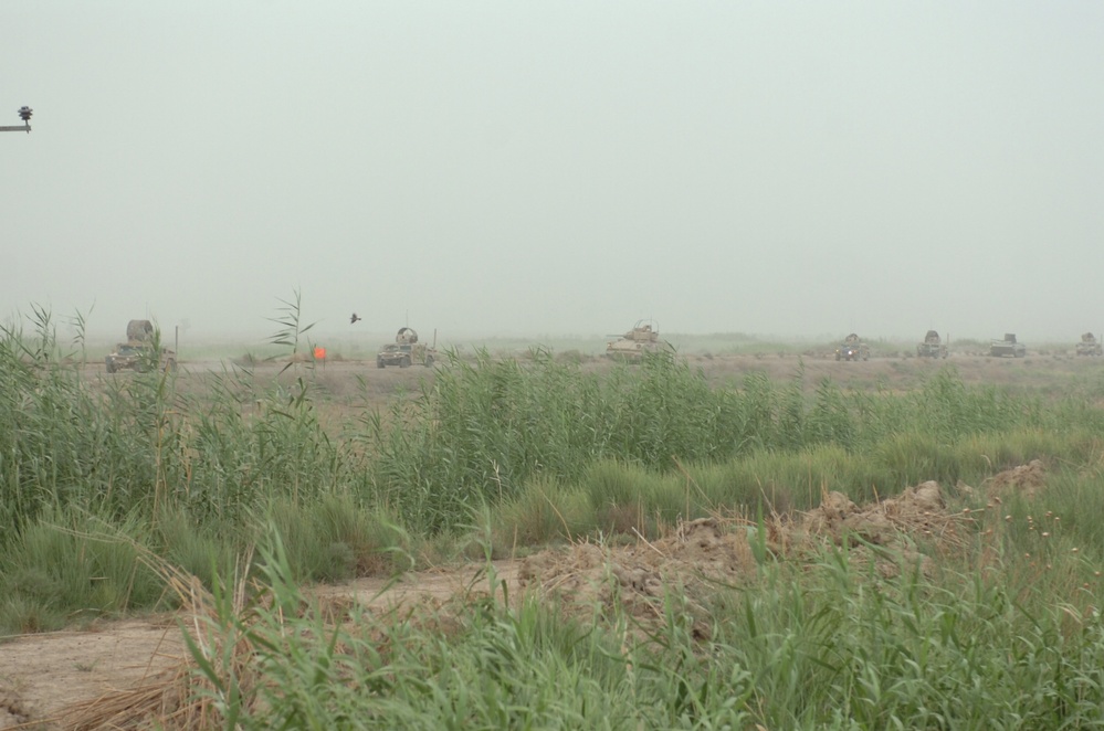 Army Vehicle Launched Bridge, Bucket Loader and the Recovery Vehicle