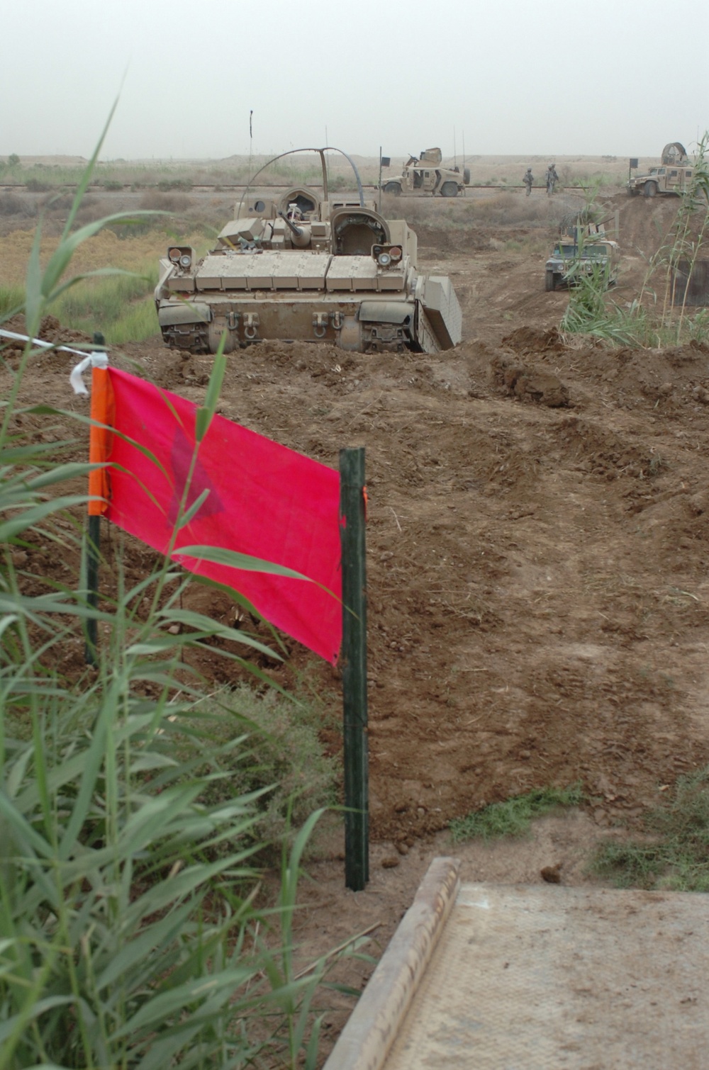 Army Vehicle Launched Bridge, Bucket Loader and the Recovery Vehicle