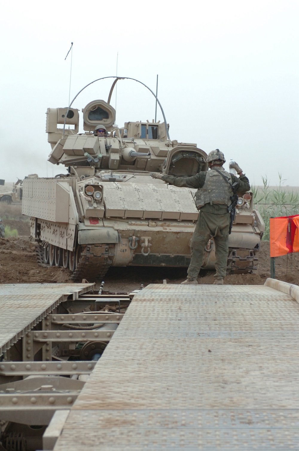 Army Vehicle Launched Bridge, Bucket Loader and the Recovery Vehicle