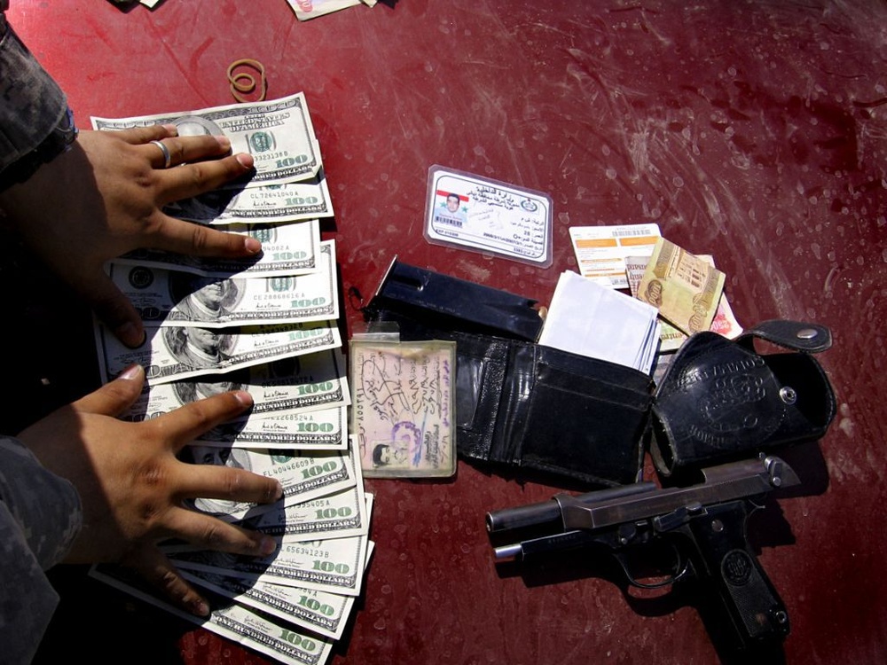 Patrol nets insurgent money handlers