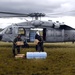 Navy Aircrew Delievers Supplies, Transports Injured