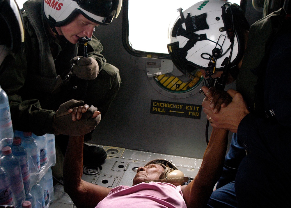 Navy Aircrew Delievers Supplies, Transports Injured