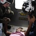 Navy Aircrew Delievers Supplies, Transports Injured