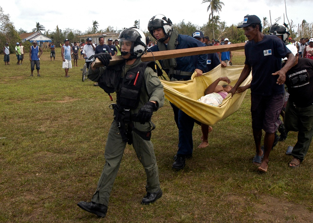 Navy Aircrew Delievers Supplies, Transports Injured