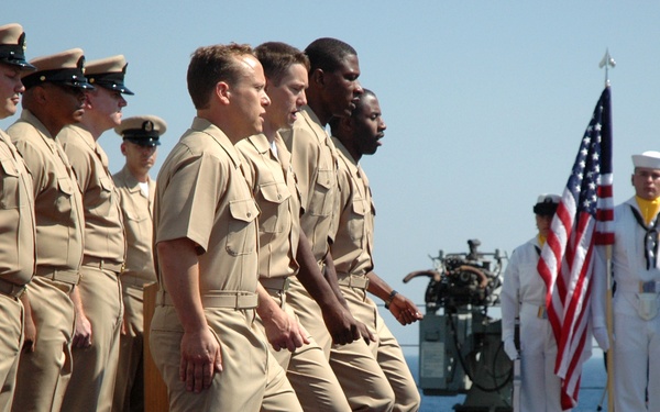 pinning ceremony aboard amphibious command ship USS Mt. Whitney