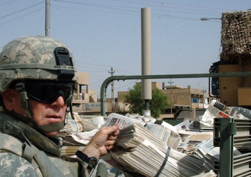 Soldiers Distrubute Baghdad Now