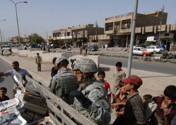 Soldiers Distrubute Baghdad Now