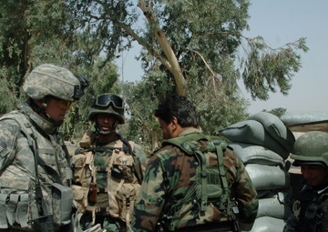 Soldiers Distrubute Baghdad Now