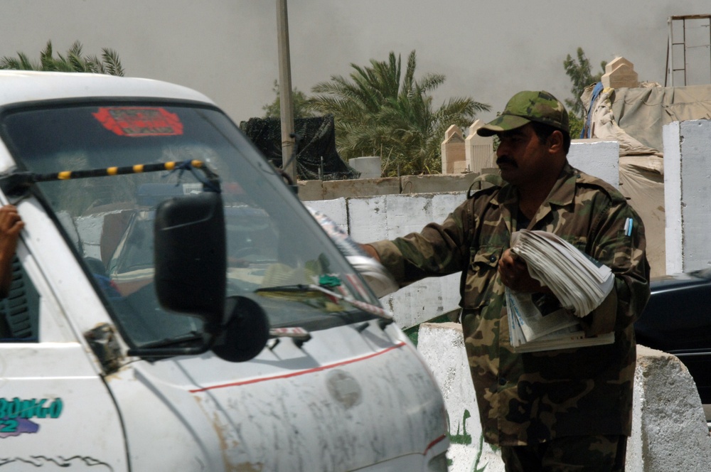 Soldiers Distrubute Baghdad Now