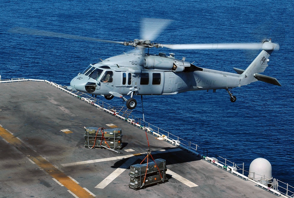 MH-60S Seahawk  sets down a pallet of ammunition