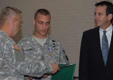 Malmberg Receives His Certificate