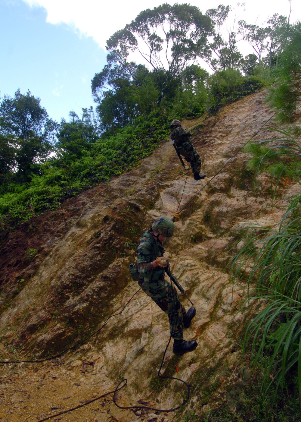 DVIDS Images Seabees rappel down a cliff during jungle warfare training