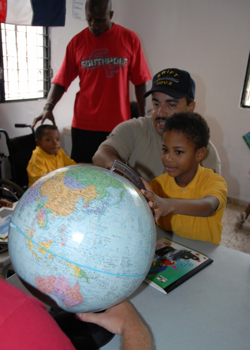 Task Group 40.9 Sailors Help Orphans in Dominican Republic