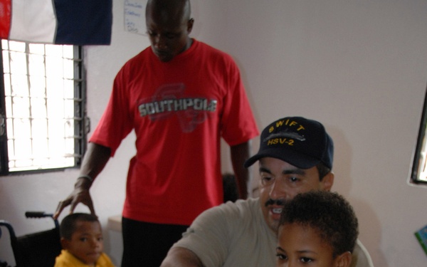 Task Group 40.9 Sailors Help Orphans in Dominican Republic