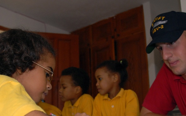 Task Group 40.9 Sailors Help Orphans in Dominican Republic